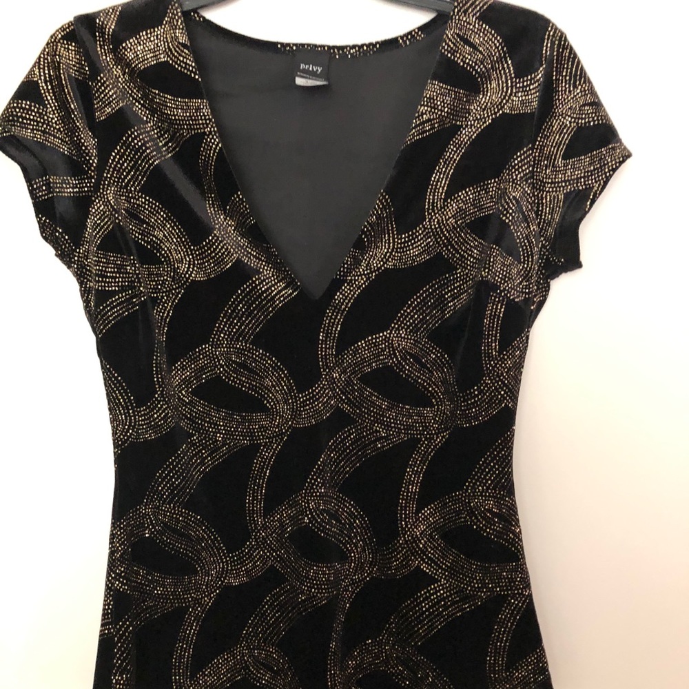 Black and gold bodysuit